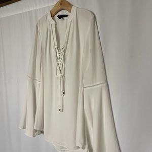 Whitish-cream long sleeved blouse. Size 0 by White House Black Market.